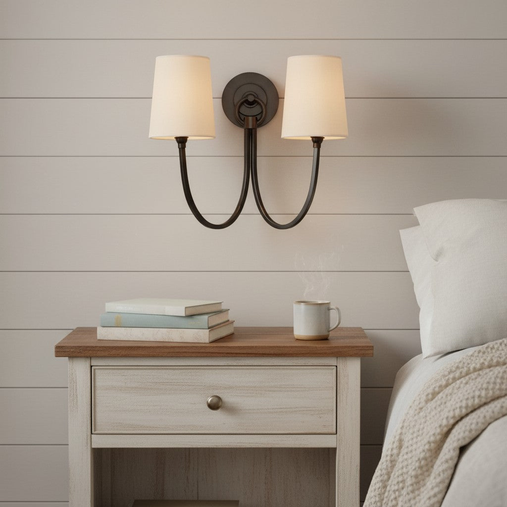Curved metal wall lighting fixture