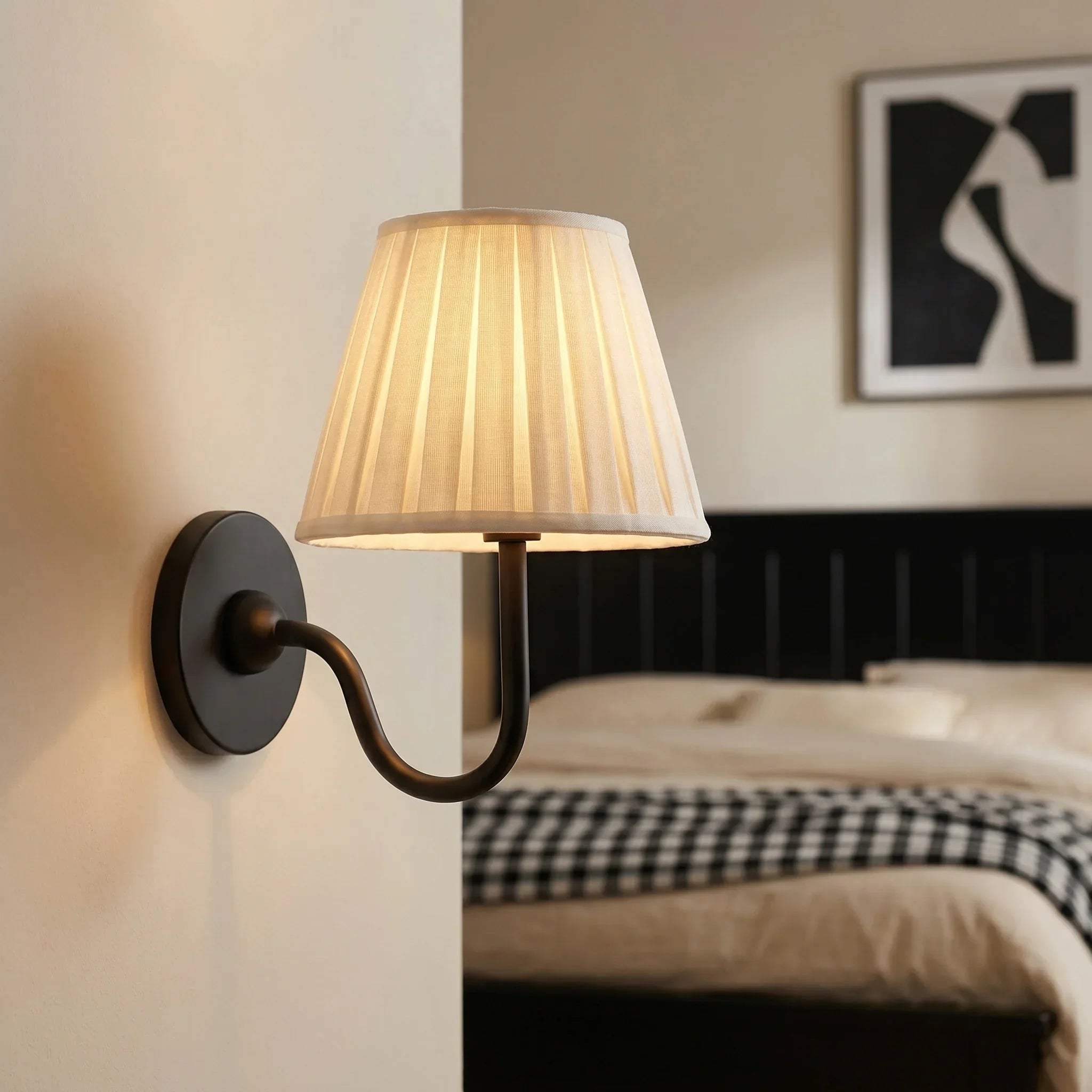 Transitional fabric wall sconce