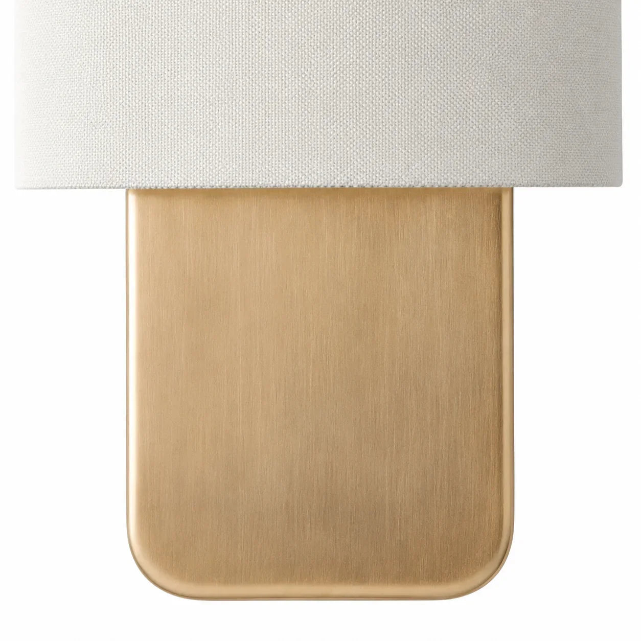 Linen wall sconce with ambient lighting