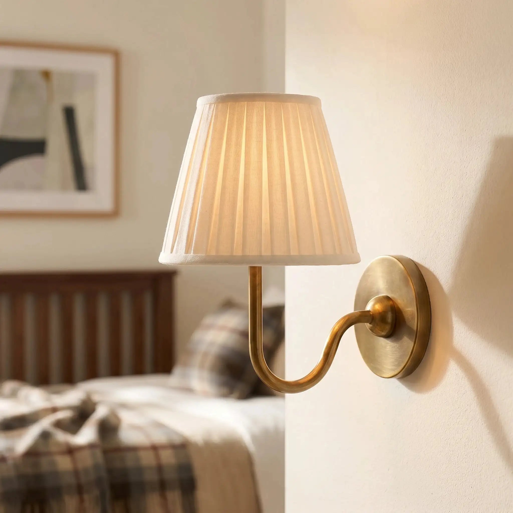 Fabric and metal wall sconce