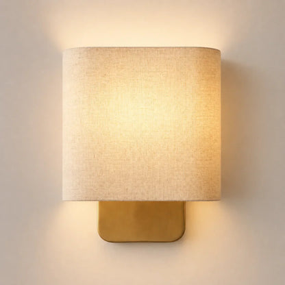 Metal wall sconce with linen shade