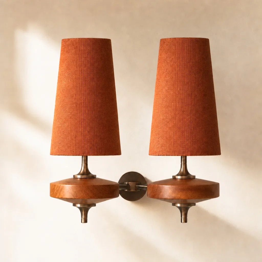 Wall sconce with tapered fabric shade
