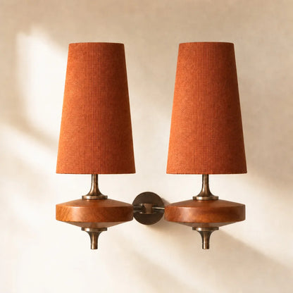Wall sconce with tapered fabric shade